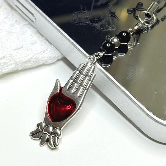 Gothic silver healing hand phone charm with a ruby red enamel heart by Case not Cake