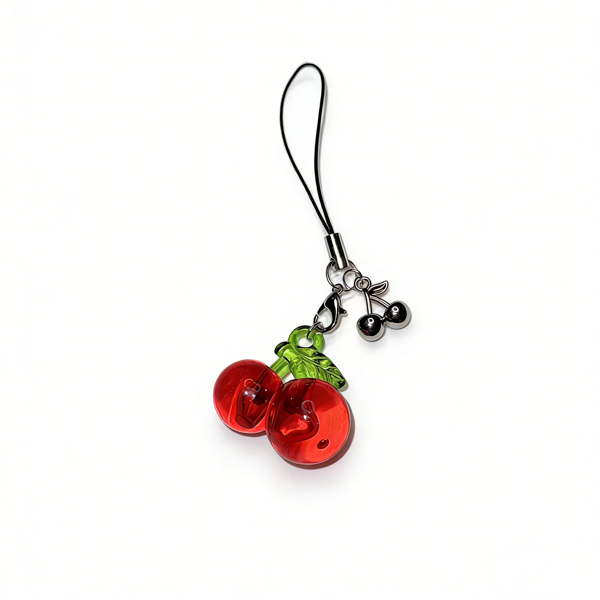 Handmade mini phone charm with glossy red cherry beads and a small silver metal cherry pendant .