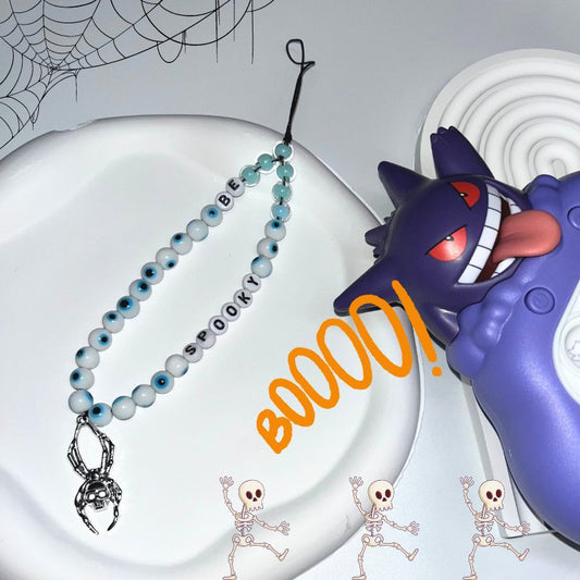 Halloween phone charm blue eyeballs